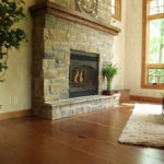 Fireplace area with douglas fir reclaimed wood floor