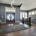 Stairwell with weathered antique reclaimed wood flooring