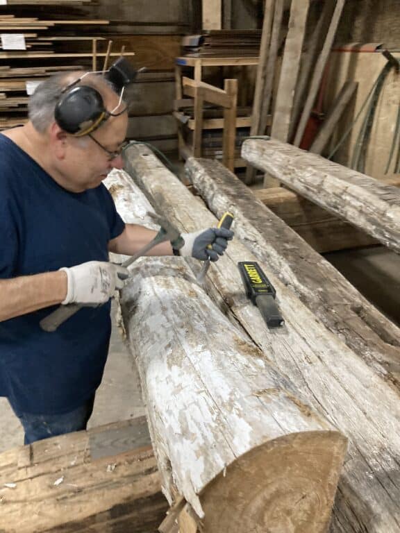 George de-nailing at manomin resawn timbers in hugo minnesota