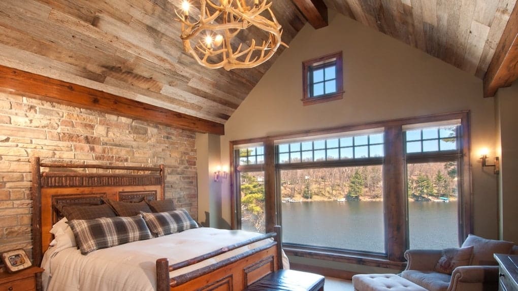 bedroom with wormy chestnut reclaimed wood ceiling