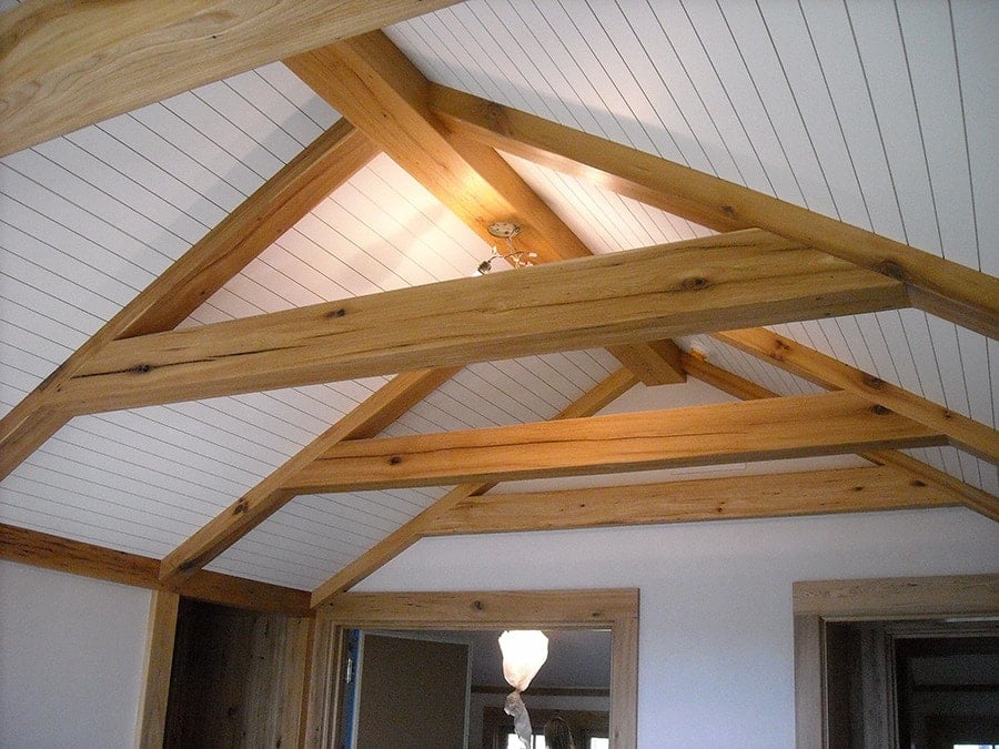 antique elm reclaimed wood beams on ceiling inside home