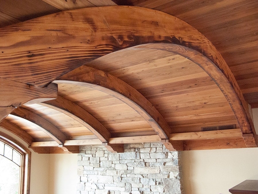 arched antique elm reclaimed wood beams inside home