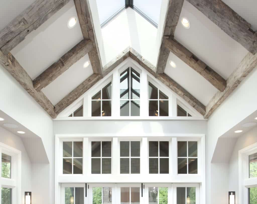 reclaimed timbers vaulted ceiling living room; reclaimed wood beams