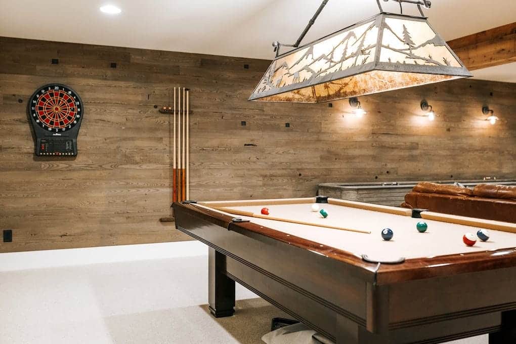 downstairs basement with reclaimed wood wall panel; reclaimed wood wall ideas
