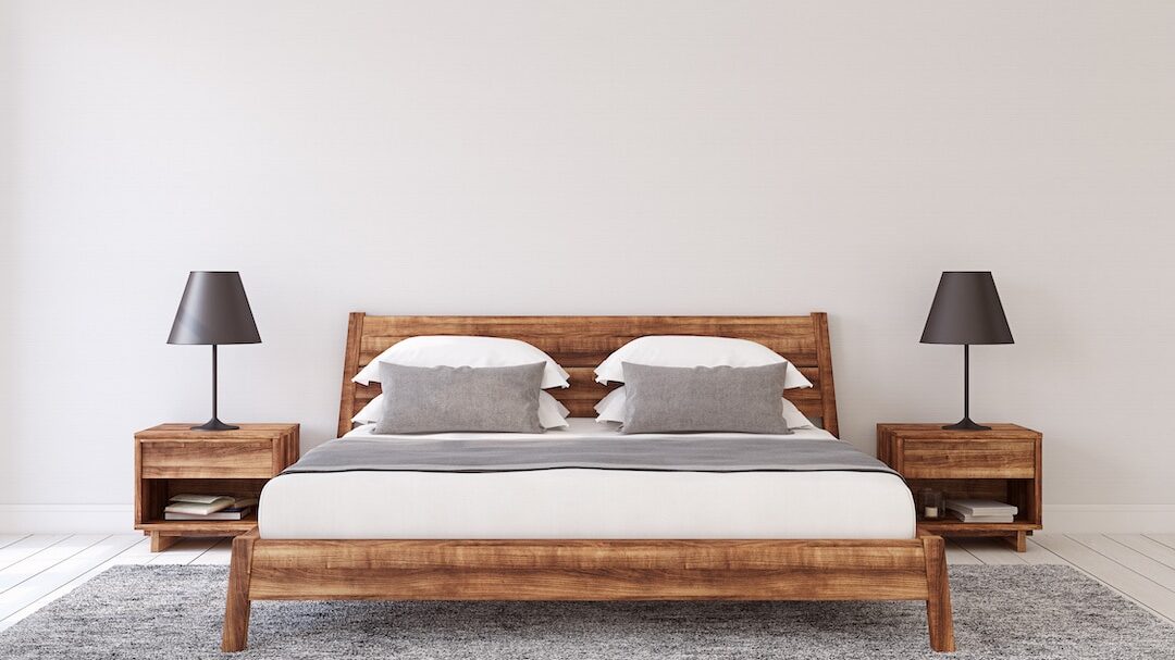reclaimed wood bedframe in bedroom