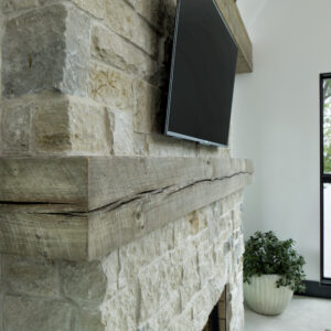 reclaimed wood fireplace mantel by Manomin Resawn Timbers