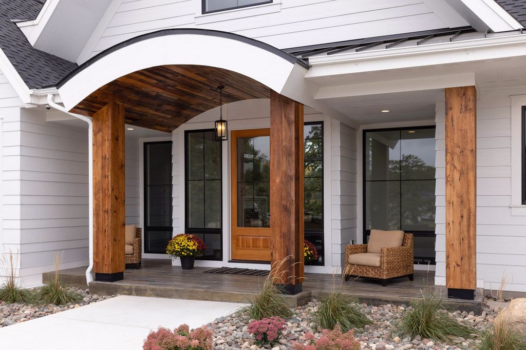 weathered antique beams in the front of a bellepar home. weathered antique is a mix of softwoods generally pine