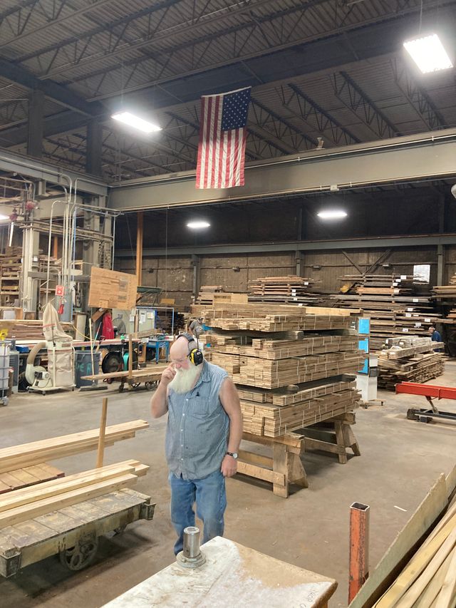 a look at the shop at Manomin, a shot of one of there workers standing in the shop