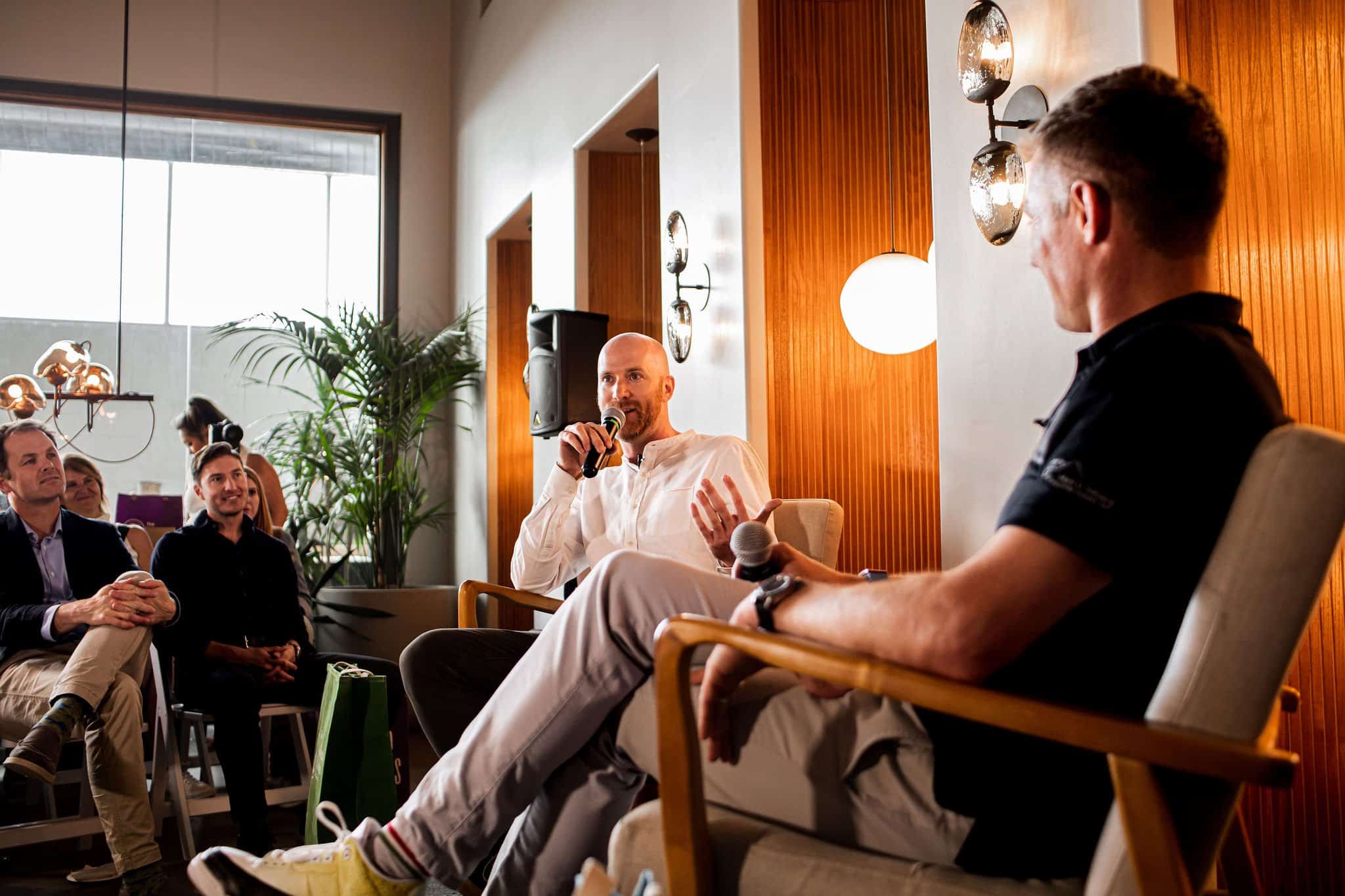 Mark D Williams interviewing the owner of Hennepin Made at the curious builder podcast live event