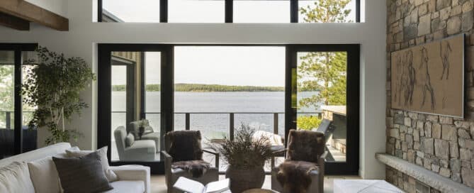 a view of the lake from the living room or great room that really boosts the amazing architecture design