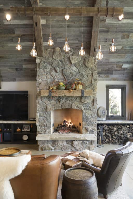 Reclaimed wood light fixture in a living room supplied by Manomin Resawn Timbers