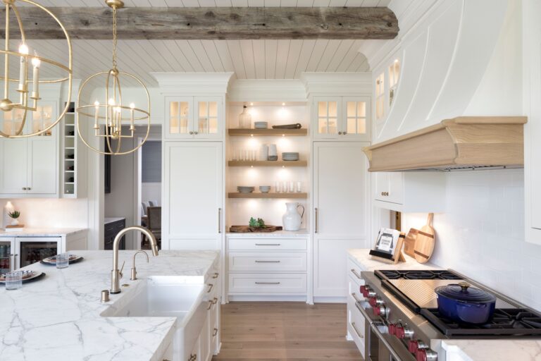 weathered antique box beams in a modern kitchen for a project that was built by Gonyea Homes