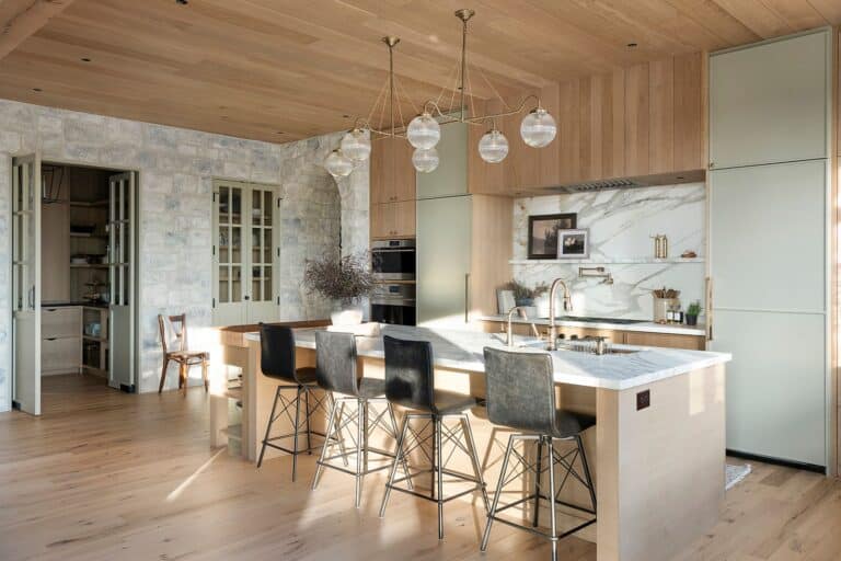 Ktichen designed by Tays and Co Design Studios with reclaimed wood white oak floors, ceiling, and custom cabinets.