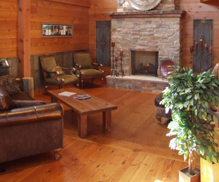 Douglas Fir signature reclaimed wood flooring cabin style living area with rustic wood furniture