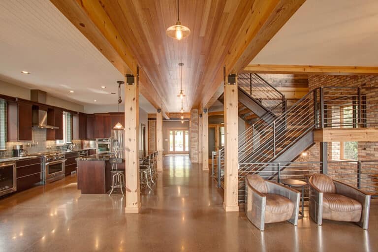 Reclaimed wood heart pine ceiling accent paneling in a grand modern room