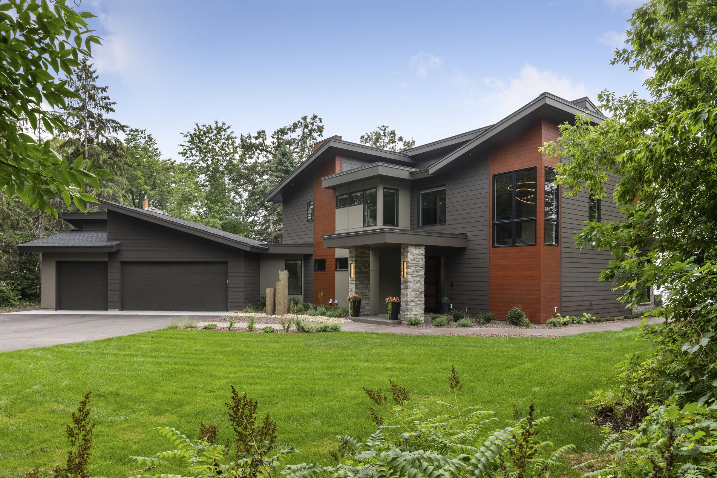 Mid-century modern lake home from Minnesota home builders Zehnder Homes on Forest Lake.