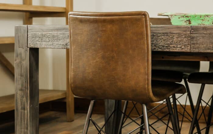 Rustic skip oak making the best wood flooring with a wood table and a chair