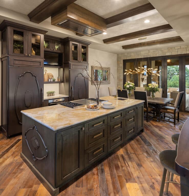 Kitchen island with dark wood and weathered antique flooring