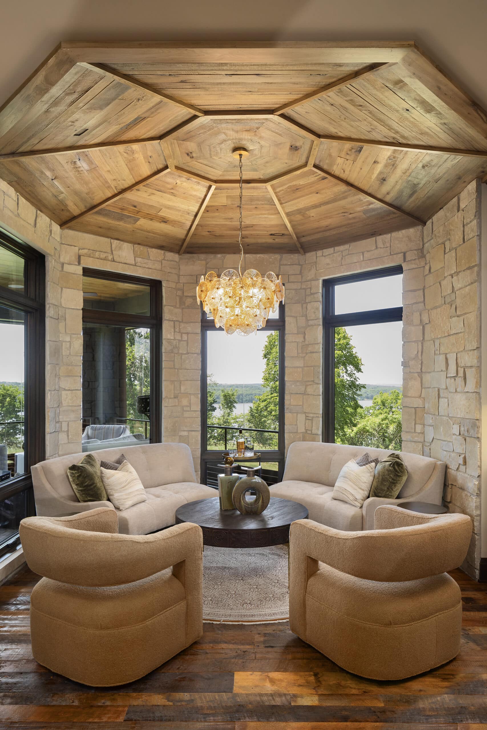 Decorative antique elm wood paneling ceiling over octagonal sitting area