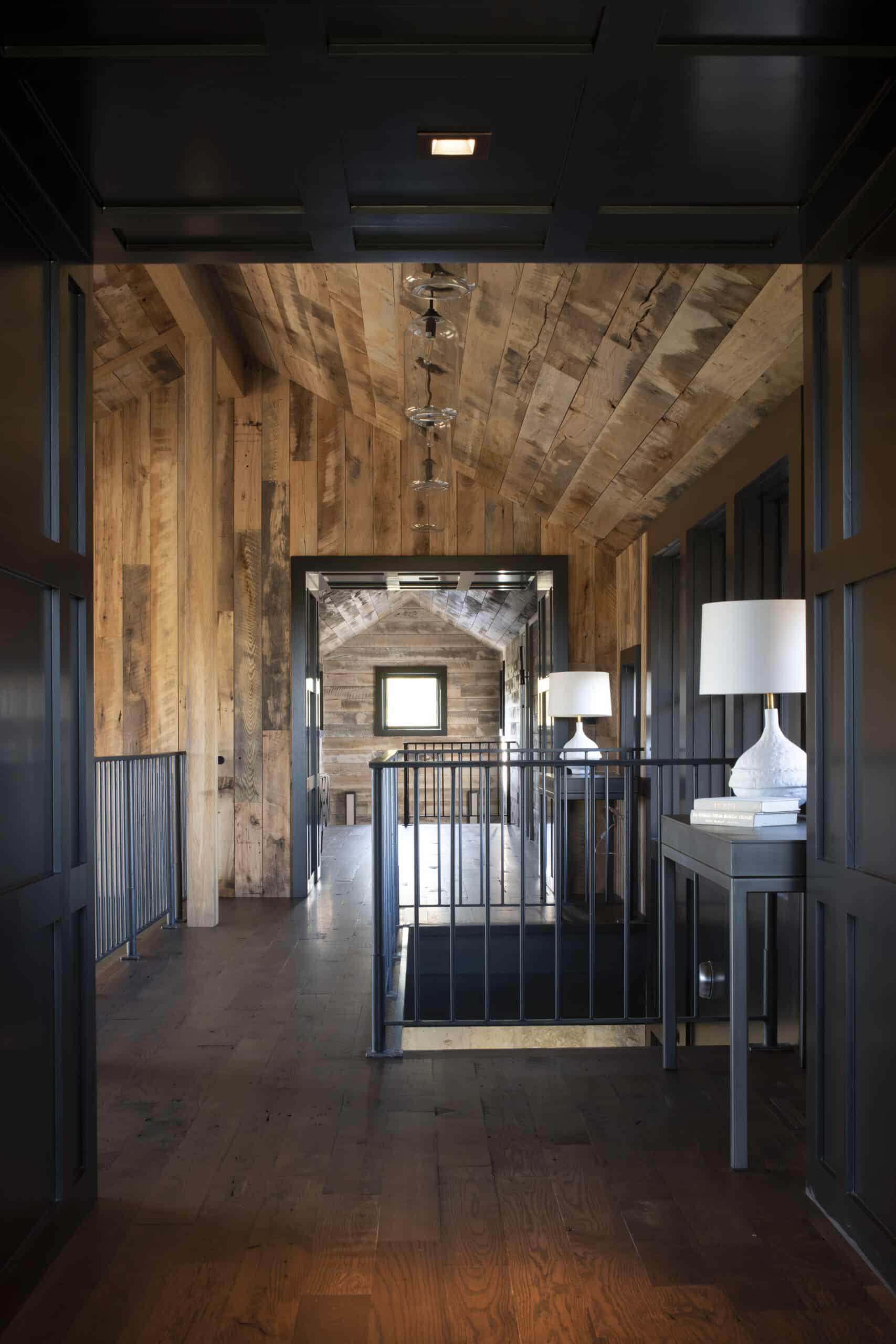 Upper landing and hallway with skip planed antique oak flooring and reclaimed wood panel ceiling