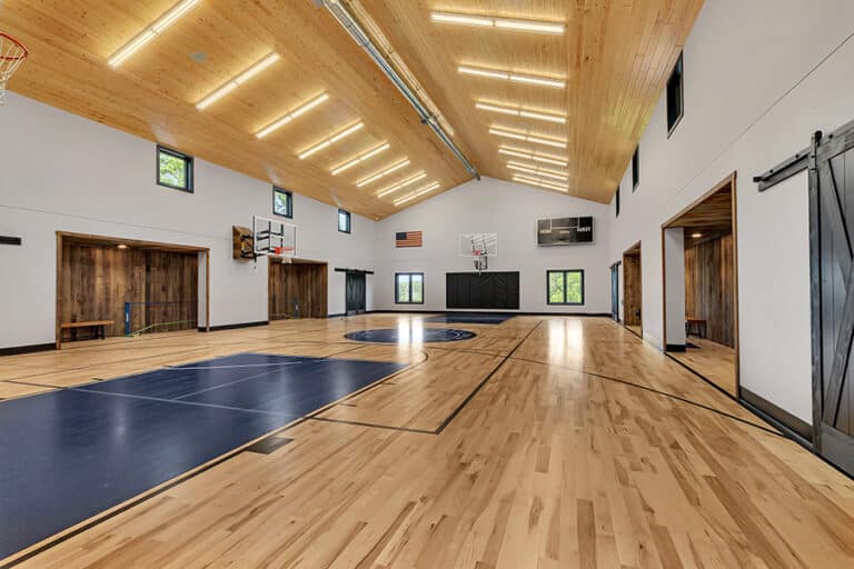 Custom built home sports barn basketball court and gymnasium