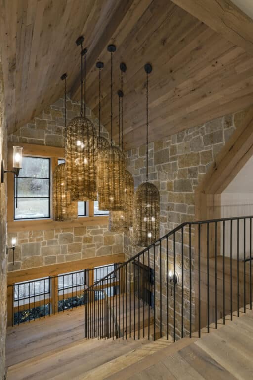 Reclaimed wood ceiling white oak paneling over stairway