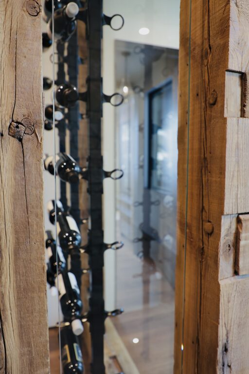 Freestanding wine rack with hand hew timber frame