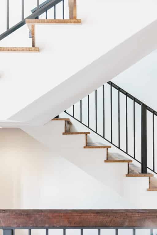 Side shot of staircase switchback with skip planed oak stair design ideas