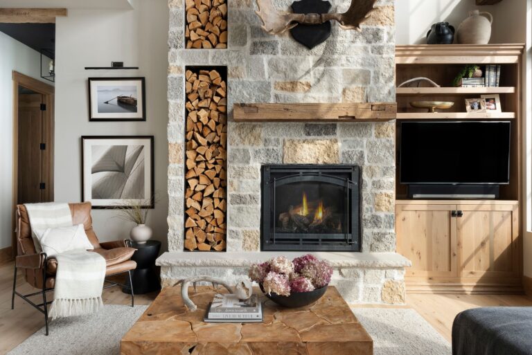 Reclaimed wood fireplace mantel showcasing rustic character and craftsmanship, installed above a fireplace, with natural wood tones and textured details.