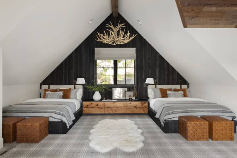 Twin bedroom with gabled ceiling and Shou Sugi Ban accent wall.