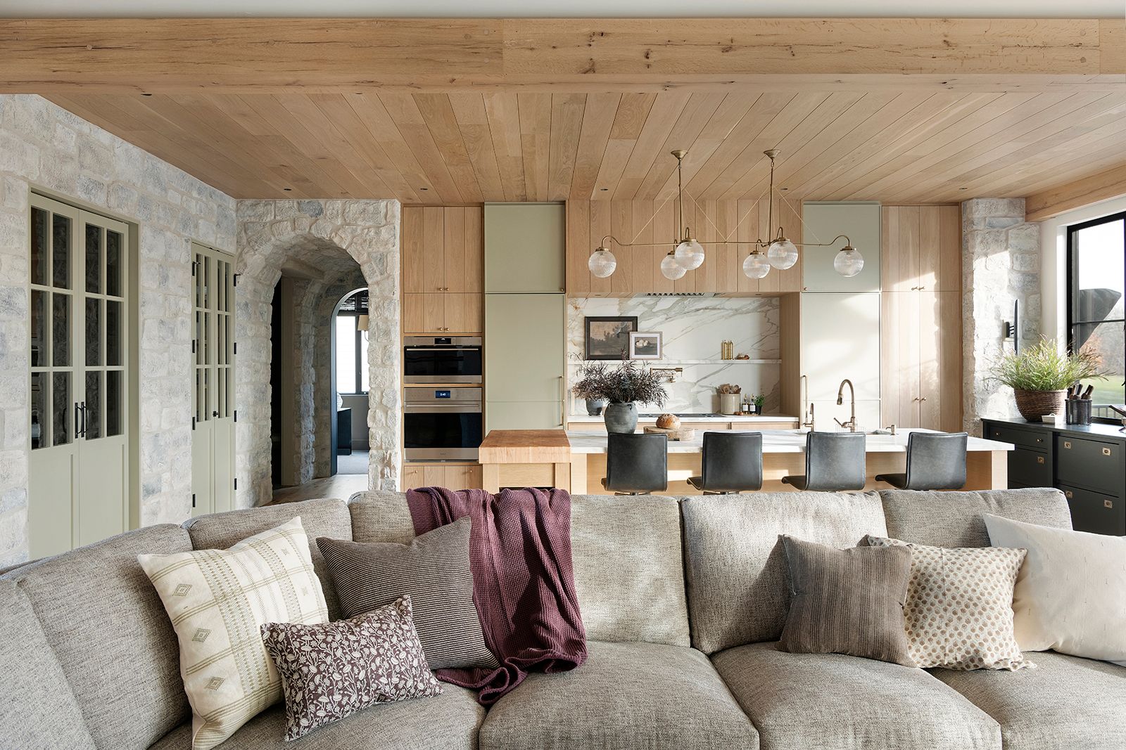 Elegant kitchen with antique white oak ceiling and cabinetry, highlighting light wood tones and oak wood texture for a clean, sophisticated look.